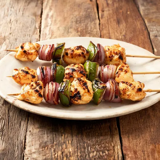 Greek Chicken Kebabs With Yogurt-Feta Marinade: 280 kcal, 36 g protein, grade A